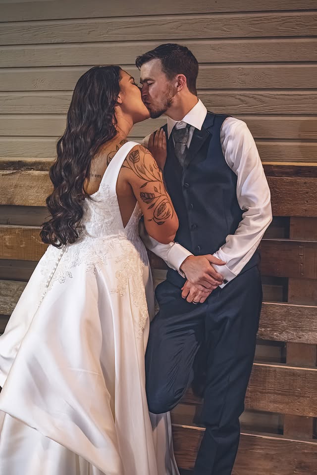 Newlyweds share a kiss